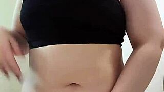 Nicole teases her fat ass in the bathroom - dirty and cute contrast