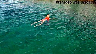 Naked Girl Flashing in Blue Water