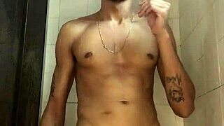 young guy with big dick jerks off in the shower