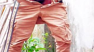 Small hairy black cock pissing outdoor and indoor in public