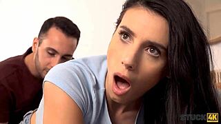 Hey, can you believe this Romanian brunette’s hooked on phones and banging on the sofa?