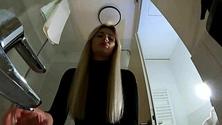 Hot blonde babe with big tits and ass strips fiercely in the bathroom.