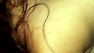 In this retro blue film, the prostitute whispers, 'want to see my tricks?'