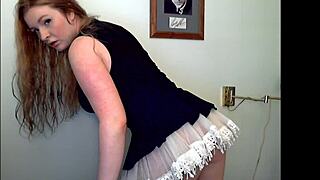 redheaded slut strips teasing with her ass and tits, ripping clothes like a fuck doll