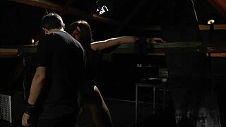 scarlet faces intense discipline as a bound slave in the shadowy bdsm lair