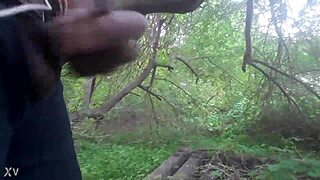 A guy masturbates outdoors and shoots his cum all over the trees in a casual cumshot scene