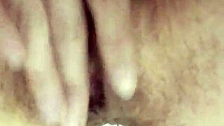 Hairy pussy drips in solo orgasm close-up