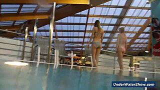 horny teen girls strip each other in the pool underwater