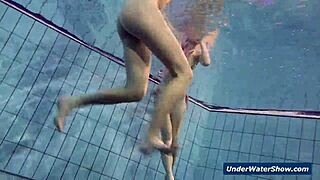 horny teen girls strip each other in the pool underwater