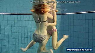 horny teen girls strip each other in the pool underwater