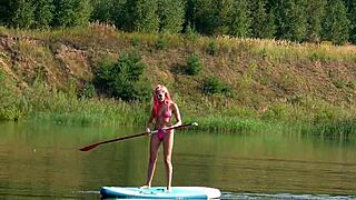 sup and pink micro bikini flashing outdoors