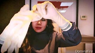 Nurse uses latex gloves in hospital for patient