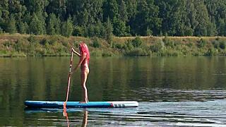 sup and pink micro bikini flashing outdoors