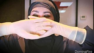 Nurse uses latex gloves in hospital for patient