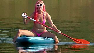 sup and pink micro bikini flashing outdoors