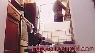 Tall girl ignores cleaning in kitchen voyeur recording