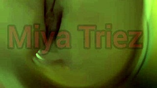 miya triez performs a teasing striptease