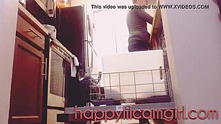 Tall girl ignores cleaning in kitchen voyeur recording