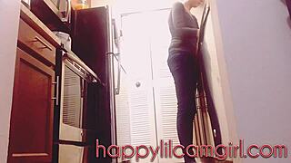 Tall girl ignores cleaning in kitchen voyeur recording