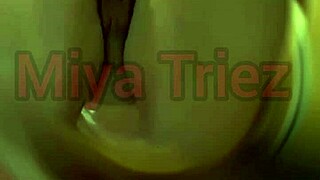 miya triez performs a teasing striptease