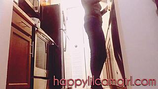 Tall girl ignores cleaning in kitchen voyeur recording