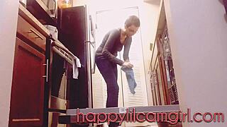 Tall girl ignores cleaning in kitchen voyeur recording