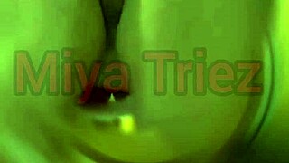 miya triez performs a teasing striptease