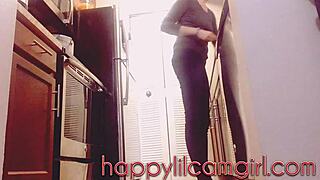 Tall girl ignores cleaning in kitchen voyeur recording