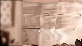 Big-ass servant folds clothes with no panties, spied in real time