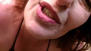 Curvy redhead Dawn worships Shawn's big black cock passionately.