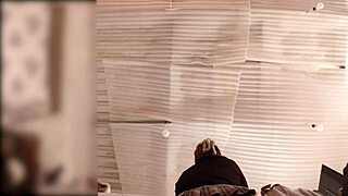 Big-ass servant folds clothes with no panties, spied in real time