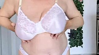 busty granny dances in sexy lingerie showing natural tits