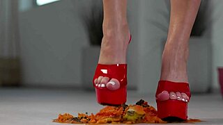 petite girl crushes fruits with high heels in hot footfetish