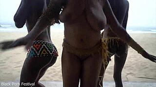 Three african tribe witches perform a rain-making dance ritual