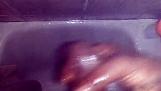 jerking my big black cock in the shower, gonna cum soon