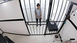 Michelle Anderson in Fema camps, spreading pussy with dildo humiliation backstage