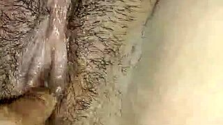 oiled girl enjoys boyfriend's touch