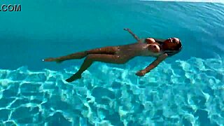 Gorgeous Monika Fox swims naked in the pool in a beautiful place