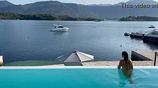 Gorgeous Monika Fox swims naked in the pool in a beautiful place