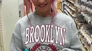 busty babe teasingly flashes her pierced nipples in the public store