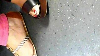 mature feet candid in wedges sandals