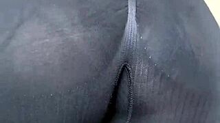 Mature woman models sheer leggings in close-up view