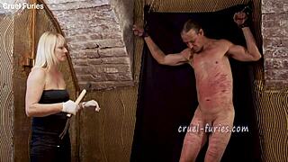 Cruel Blonde MILF Whips Guy's Cock with Brutal Pain