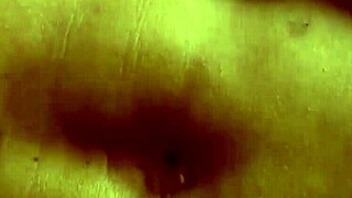 Female athlete demonstrates her large clitoris in a casual setting.