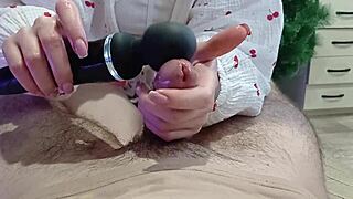 in the dimly lit room, the step sister skillfully uses a vibrator to extract cum from her partner