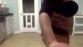 Ebony MILF's victorious pussy tease in cosplay