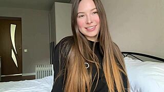 In her black t-shirt, the cute girl fingers her pussy until she cums.