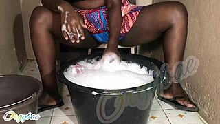 Housewife does weekend laundry at home