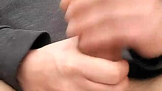 Feeling the thrill of masturbating a huge loaded cock outdoors