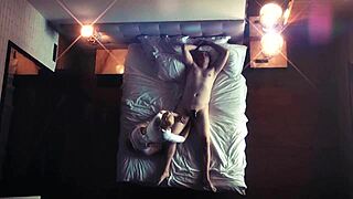 Hidden camera captures a femdom fantasy scene.